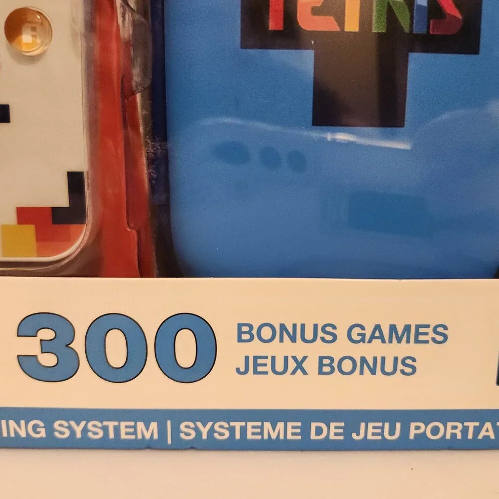 TETRIS Go Gamer with 300 Bonus Games and Travel Case Portable take with game NIB